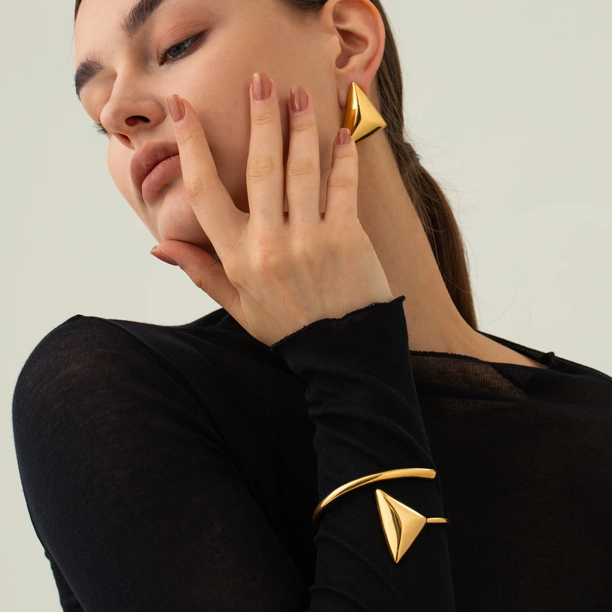 Bold triangle bangle