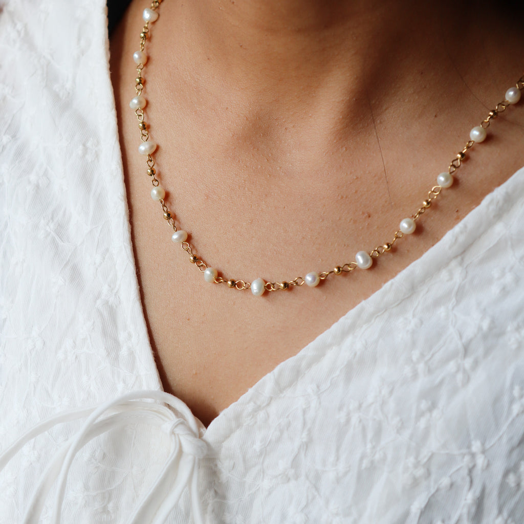Gold pearl chain
