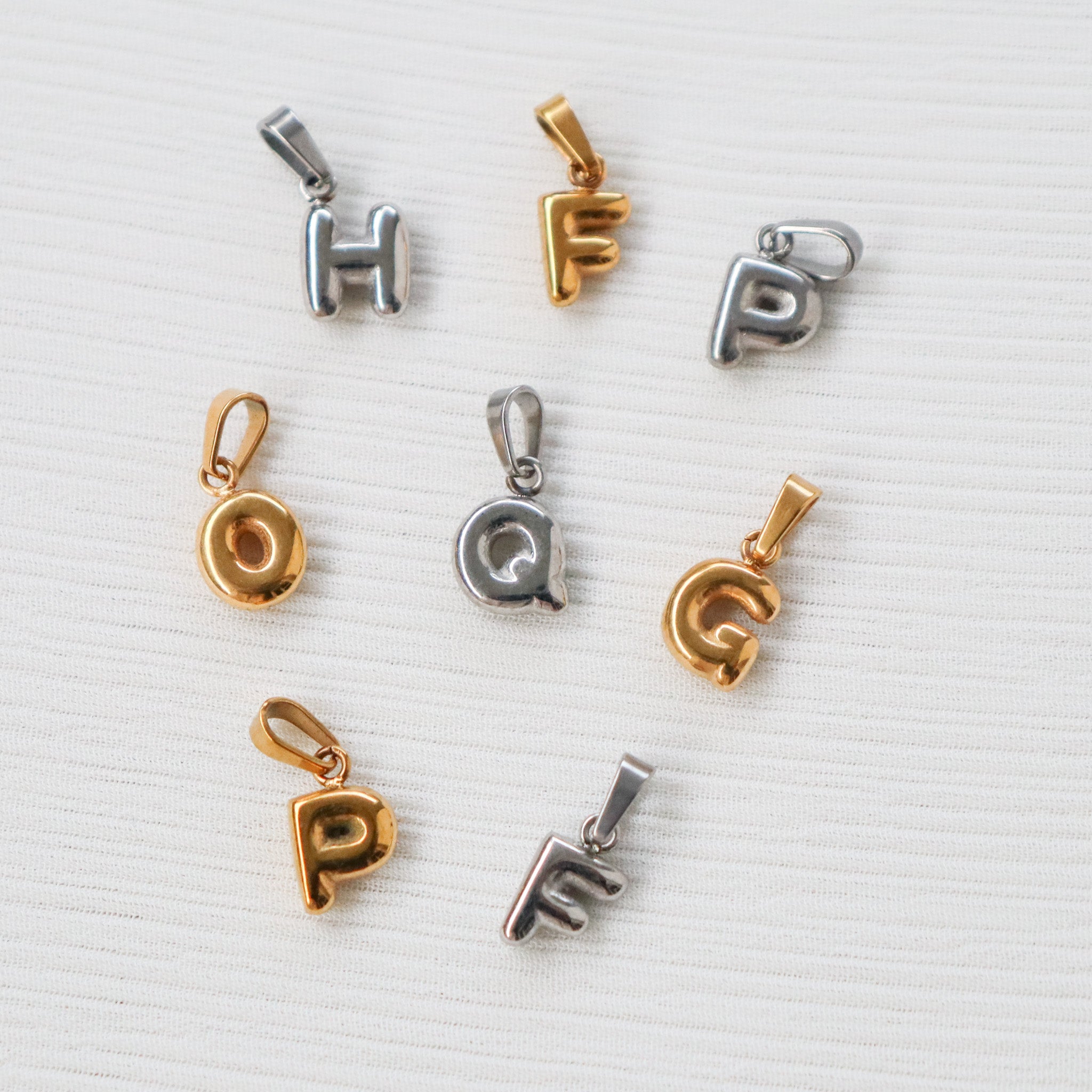 Pillow alphabet charms