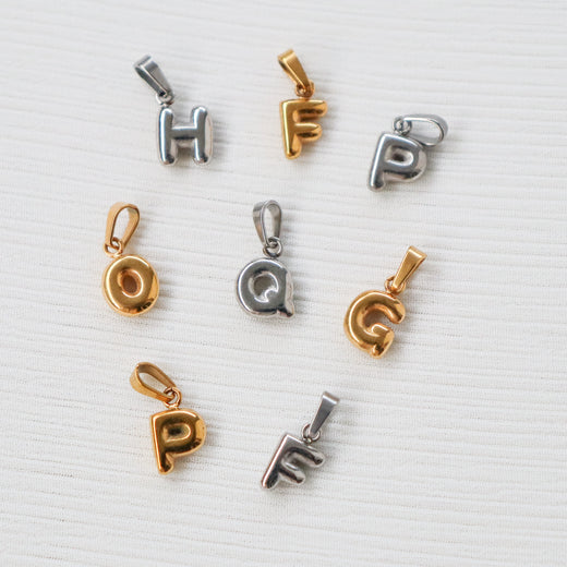 Pillow alphabet charms