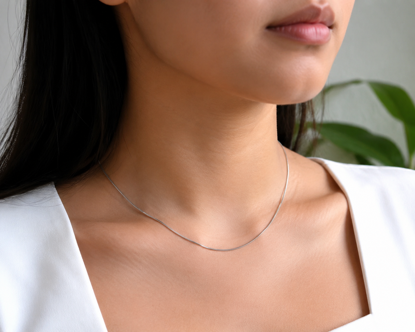 Thin Snake chain in Silver, close-up on skin