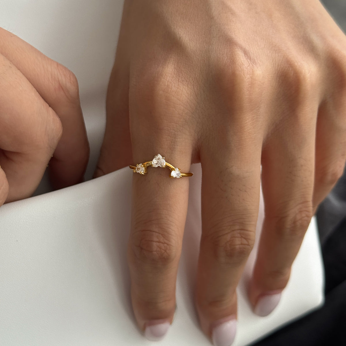 Amie Ring in gold worn