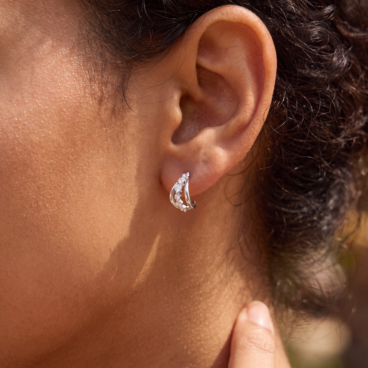 Diamond Bridge Hoops in silver worn close-up