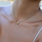 Diamond Heart Chain in gold worn close-up