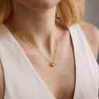 Doxie Chain in gold worn