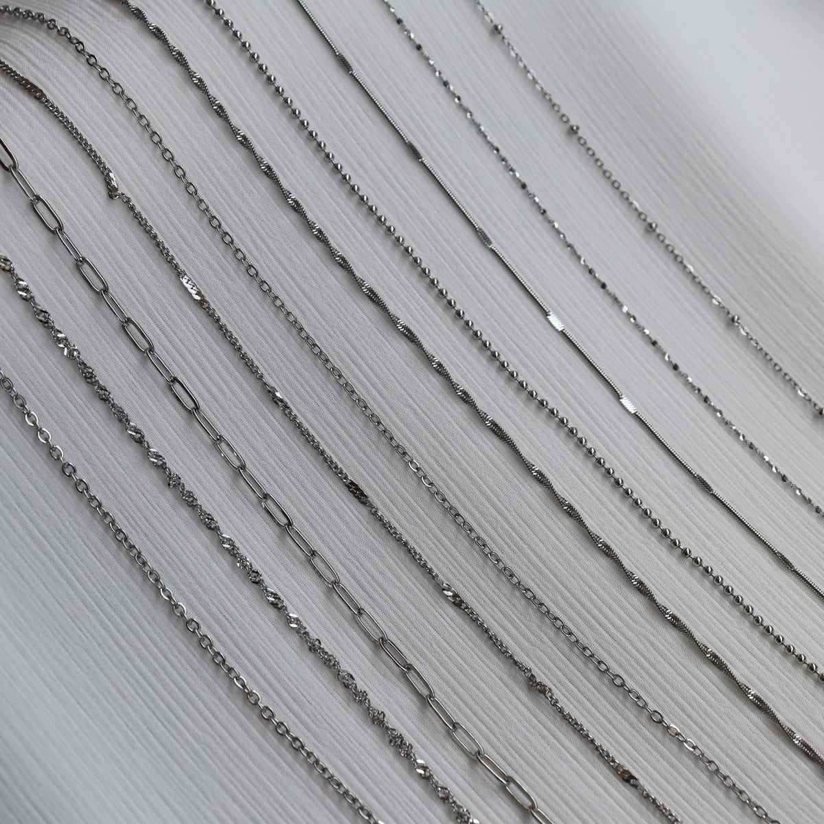 Filler chains (charm chains)