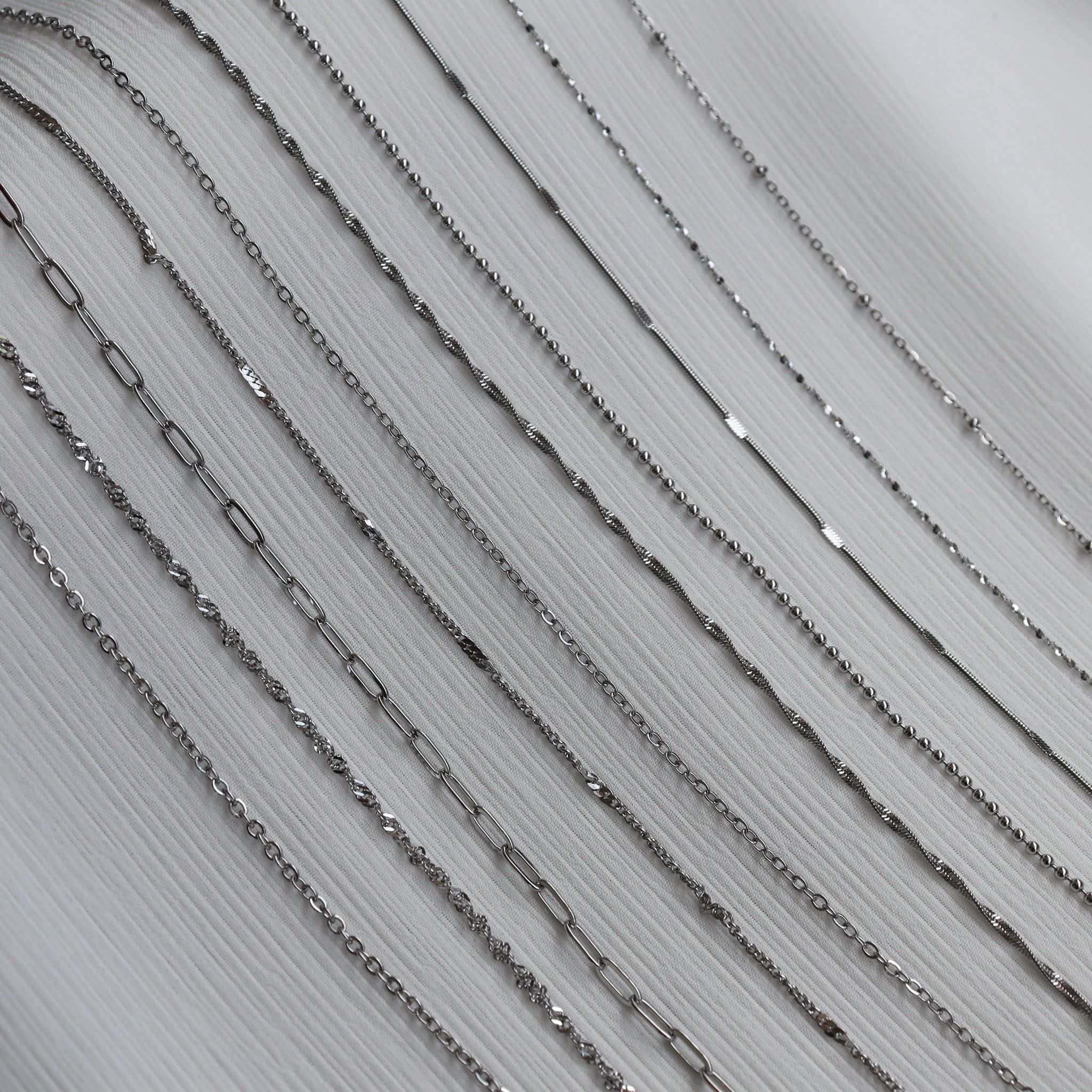 Filler chains (charm chains)