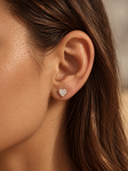 Heart Studs in gold worn alone on ear