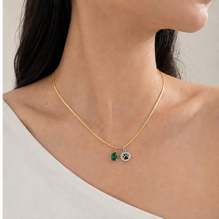 Micro Flat Chain in Gold styled with two charms on a model