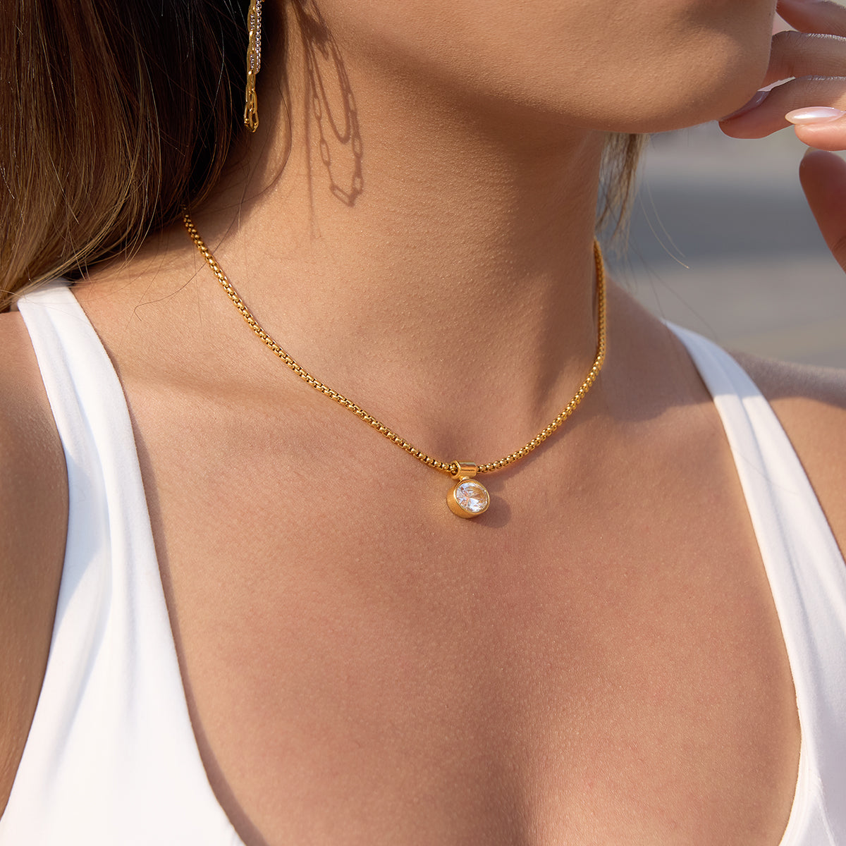 Miranda Chain in gold worn in a wider view