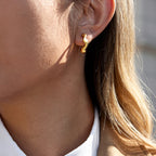 Nami Hoops in gold worn