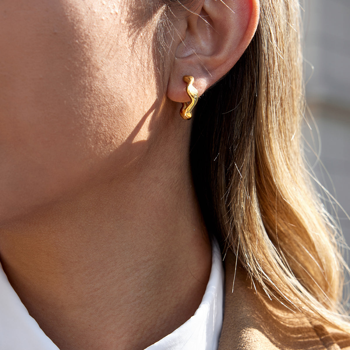 Nami Hoops in gold worn