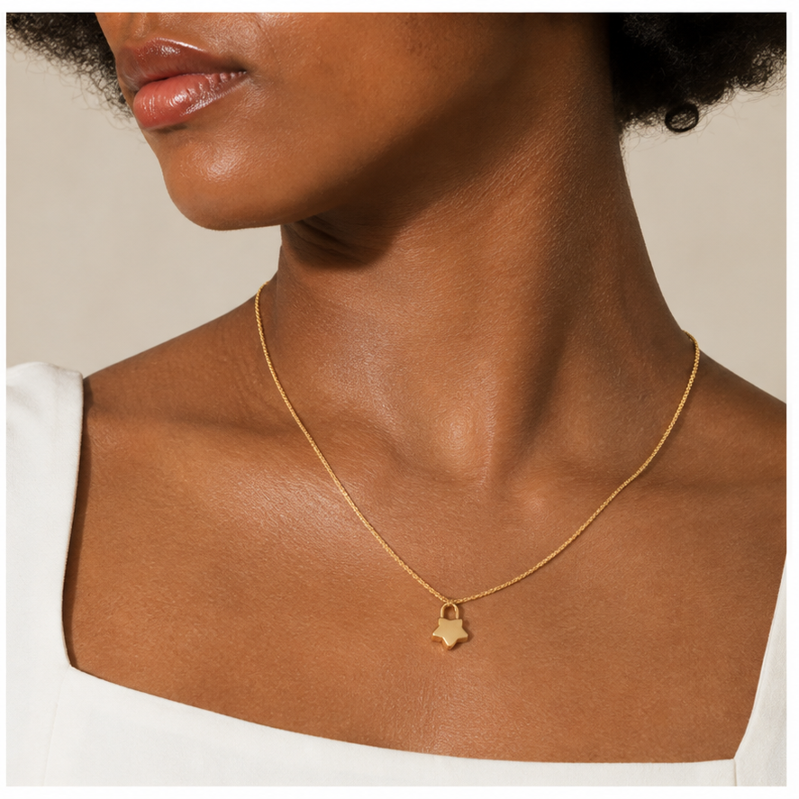 Ruffled Chain in Gold styled with one star-lock charm on a model
