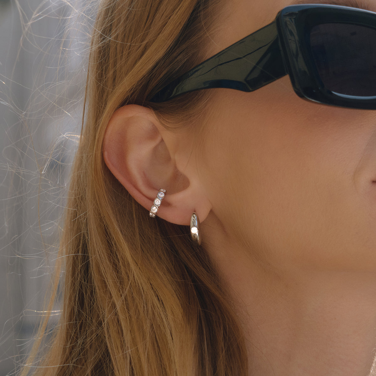 Sol Ear Cuff in silver worn close-up