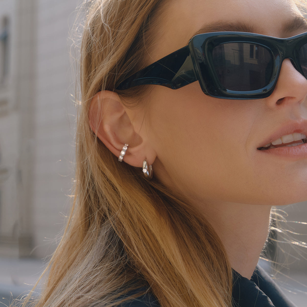 Sol Ear Cuff in silver worn in a wider view