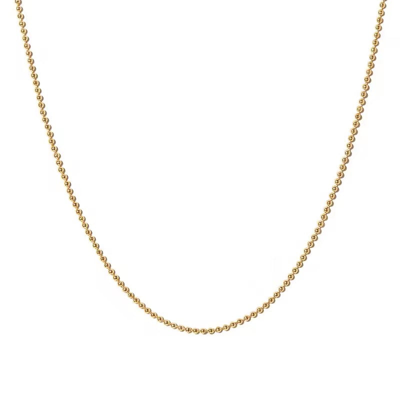 Gold Thin Bead Chain on white background