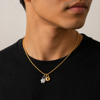 Thin Rope Chain in Gold styled with two lock charms on a model