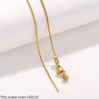 Gold Thin Snake Chain on white background