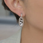 Trio Earrings in silver worn