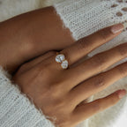 Twin Star Ring in gold worn in a wider hand view